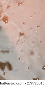 Countless Small Rain Bubbles on Smooth Brown Rainwater