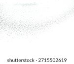 Countless tiny translucent water droplets create a dense, repetitive pattern of condensation on a smooth, reflective surface.