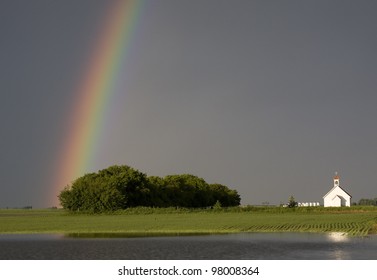 Country Church and Rainbow after storm Canada