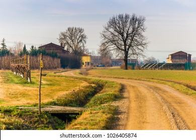 Country Dirt Road And Ditch On A Cold Winter Morning