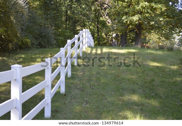 Country fence along\
a rural Michigan\
roadway