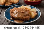 Country Fried Steak: Country fried steak with gravy and potatoes, crispy and hearty