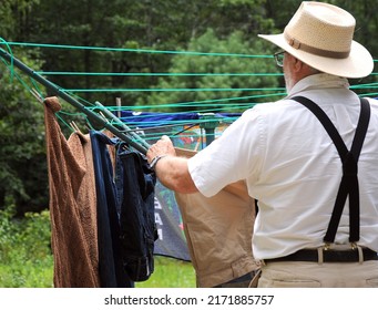 Country Gentleman Line Drying His Clothes Outside.