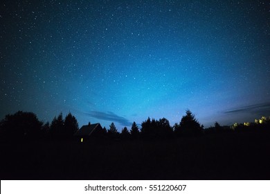 Country House In The Forest Under A Starry Sky At Night, Russia