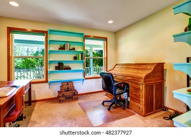 Country House Home Office Interior With Blue Shelves, Two Desks And Decorated With Wicker Chest Set. Northwest, USA