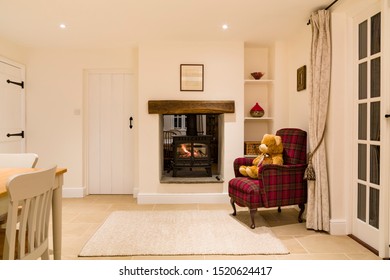 Country House Interior With Wood Burning Stove In Winter