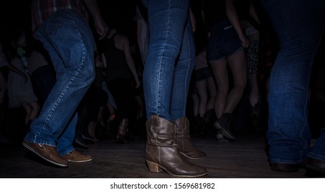 Country Line Dancing In A Dark Bar 