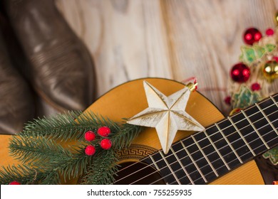 Country Music Background With Acoustic Guitar And Christmas Decoration 