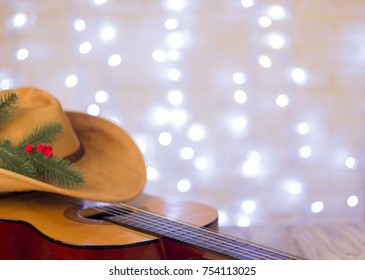 Country Music Christmas With Acoustic Guitar And American Cowboy Hat