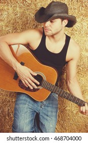 Country music man playing guitar