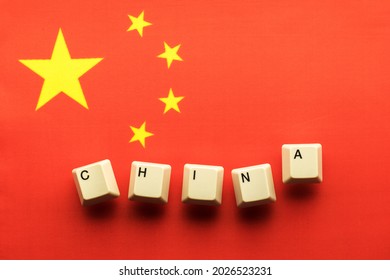 The country name China consists of keyboard keys in front of the national flag of China.