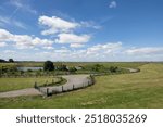 Country road along the dike in Dutch Province Groningen