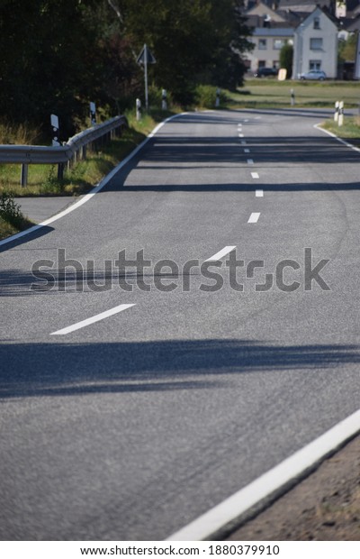 country road curve with new
asphalt