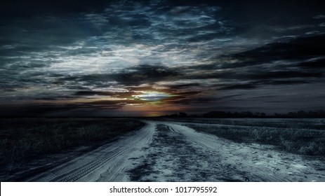 Country Road At Night With Large Moon