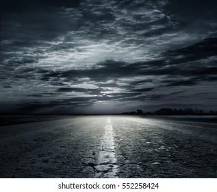 Country Road At Night With Large Moon