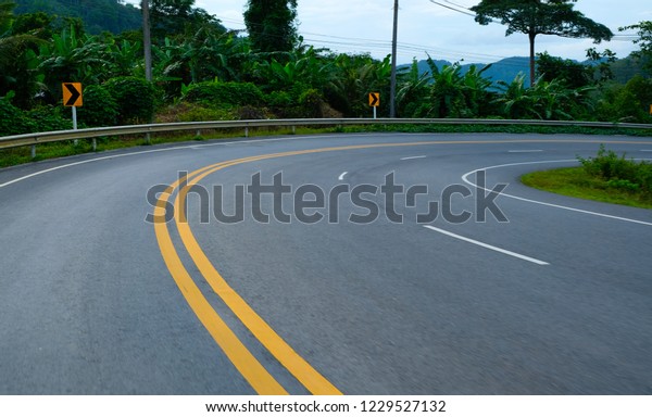 country road and sharp\
curved on mountain