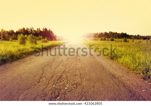 Country road at sunset.\
Vintage style.
