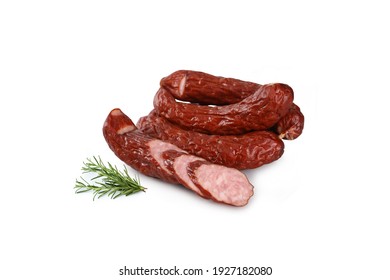 Country Style Dry, Smoked Sausage In Rings - Whole And Chopped Into Slices, Isolated On A White Background. Traditional, Eastern Europe, Polish Meat Sausage With Natural Garlic Aroma, Packshot Photo.