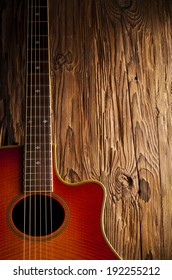 Country And Western Guitar On Wooden Background