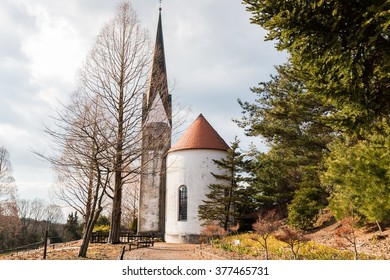 Countryside church in forest, autumn.