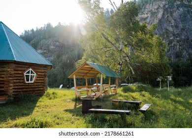 Countryside Country House Outdoor Recreation In Equipped Campsite, Tourist Parking In The Forest, Place For Bonfire Canopy From Rain, Heal The Sun. High Quality Photo