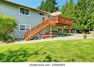 Countryside House With Wooden Walkout Deck And Patio Area