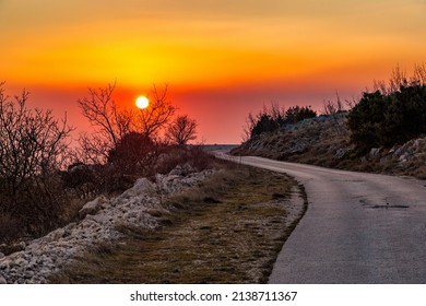 Countryside road in Croatian mountains. Evening time.