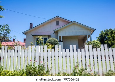 Countryside Rural House And Garden With Fence In Australia