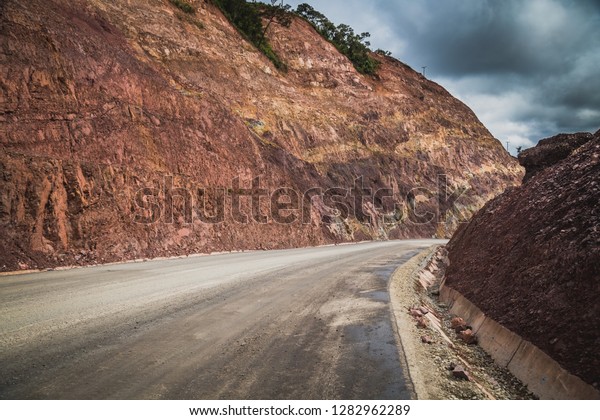 Countryside trail , off-road with mountain\
road background