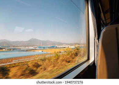 Countryside village view by train window in Korea