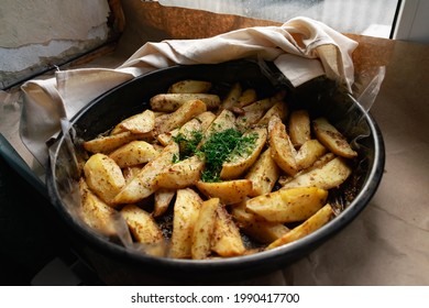 Country-style Baked Potato Wedges, Garnished With Dill, An Aromatic Spiced Home Dish, Crispy Crust And Delicious Family Food