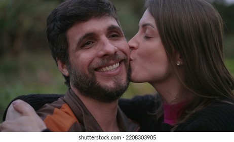 Couple In 30s Embrace Standing Outdoors At Dusk Evening Wearing Sweaters During Cold Night. Friends Hugging Each Other