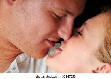 Couple Almost Kissing