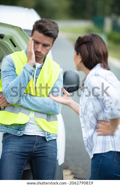 couple arguing after car\
breakdown