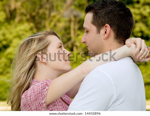 Couple Arms Around Each Other Serious Stock Photo (Edit Now) 14450896