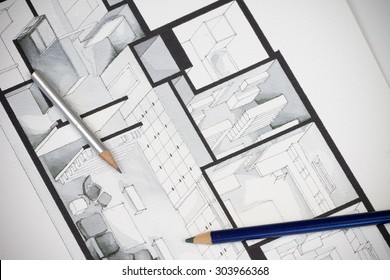 Couple Of Artistic Writing Drawing Tools Shot On Regular Real Estate Floor Plan Showing Luxurious Approach To Interior Home Design 