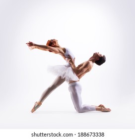 Couple Of Ballet Dancers Isolated On White