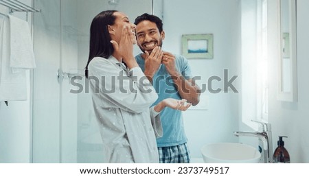 Couple, bathroom and cleaning face for skincare, routine and comic joke with cream, serum and product. Man, woman and funny with facial oil moisturiser for health, wellness and self care in apartment