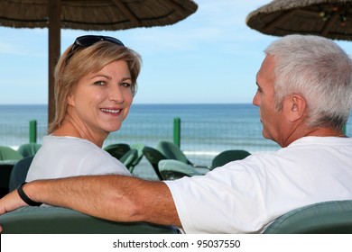 Couple At A Beach Cafe