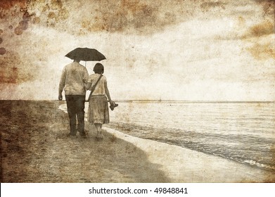 Couple at beach. Photo in old image style.
