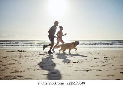 Couple, beach and running with dog for health, wellness or exercise. Mock up, diversity and man, woman and animal outdoors on sports run, exercising or workout jog on sandy seashore or ocean coast. - Powered by Shutterstock