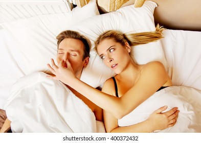 Couple In Bed,man Snoring Woman Can't Sleep
