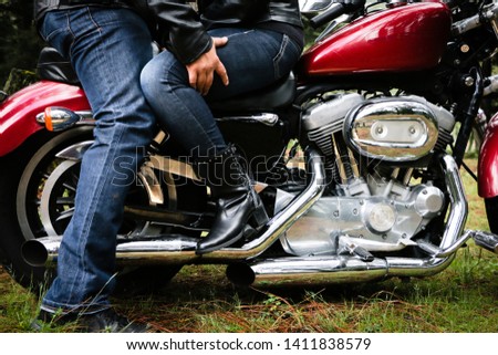 Similar – Image, Stock Photo Couple sitting over motorcycle ready to go