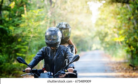 Couple Biker Riding Motorcycle 