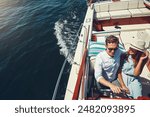 Couple, boat and ocean on holiday in summer, smile and outdoor with hug, care or travel in sunshine. Man, woman and driving yacht on cruise, water transport or adventure at sea for vacation in Monaco