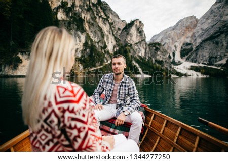 Couple boating on a quiet lake
