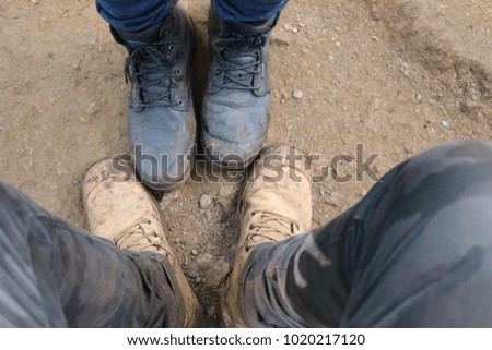 couple boots trekking together
