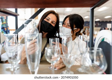 Couple Buying Home Decor At A Second Hand Store