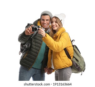 Couple With Camera On White Background. Winter Travel