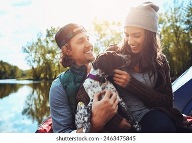 Couple, camping and lake in nature with dog for freedom, adventure travel with sustainability. Man, woman and pet in countryside by water for relax on vacation, happiness for holiday environment